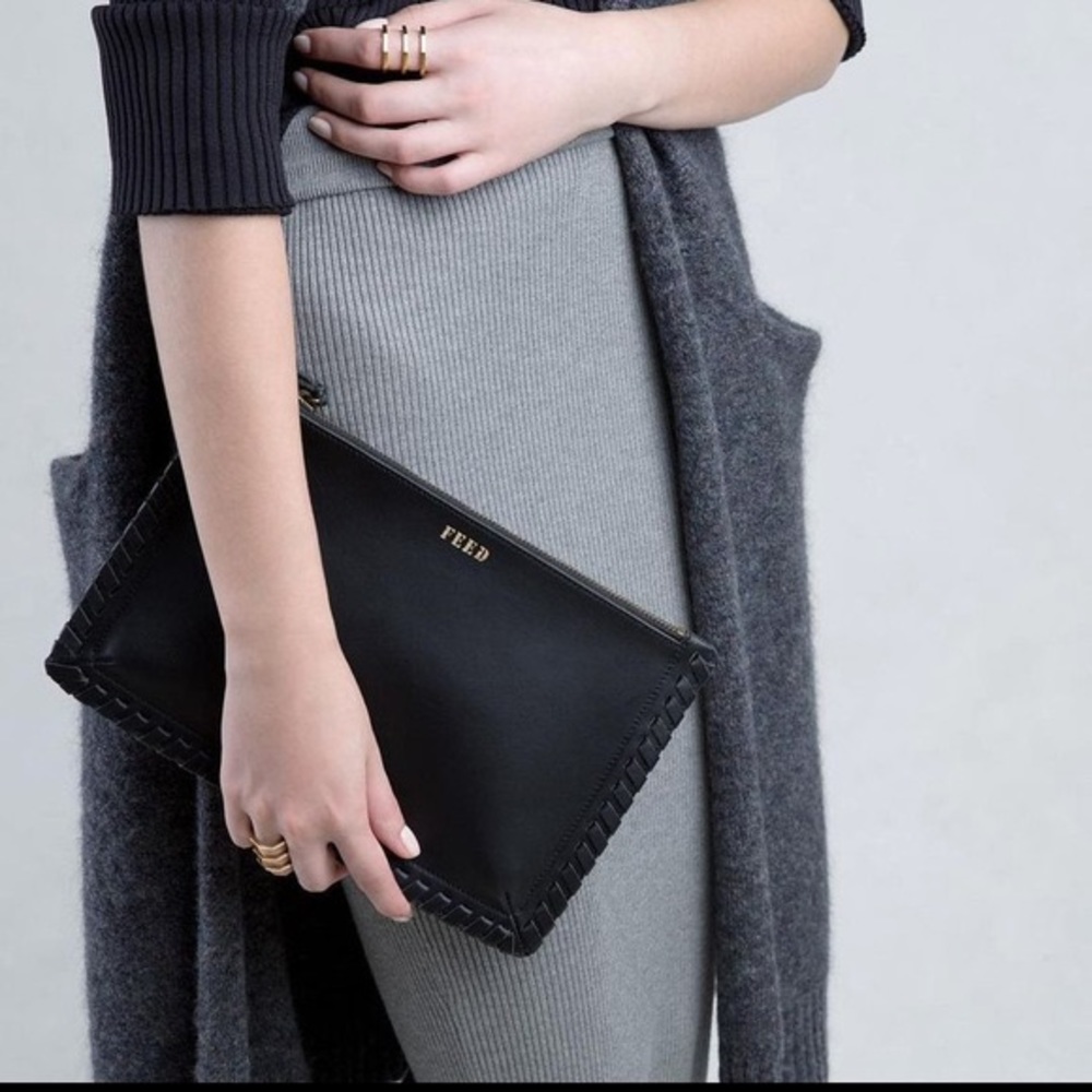 New with tags  FEED Projects- Braided Leather Clutch